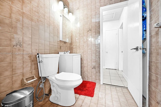 5080 E 5th Ave, Hialeah, FL 33013 - bathroom featuring tile walls and tile patterned flooring