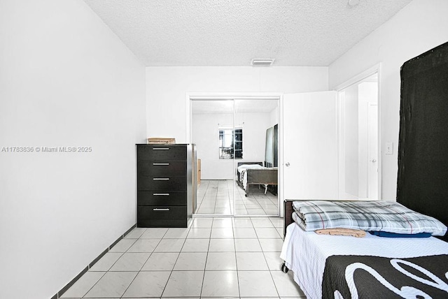 5080 E 5th Ave, Hialeah, FL 33013 - bedroom with a textured ceiling