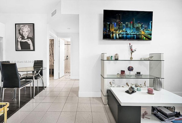 5080 E 5th Ave, Hialeah, FL 33013 - dining space featuring baseboards