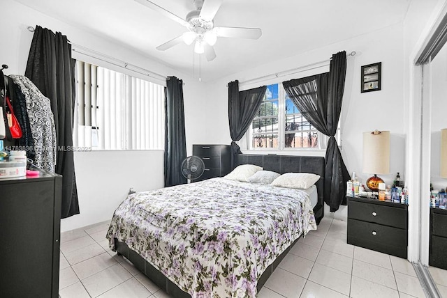 5080 E 5th Ave, Hialeah, FL 33013 - bedroom featuring light tile patterned floors and ceiling fan