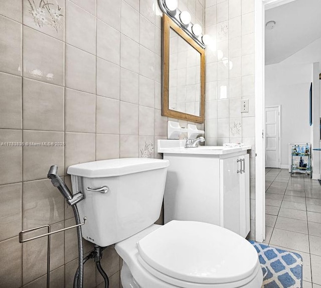 5080 E 5th Ave, Hialeah, FL 33013 - half bath with tile walls, vanity, and tile patterned floors