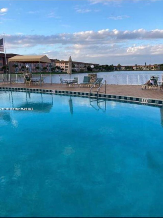 community pool with fence