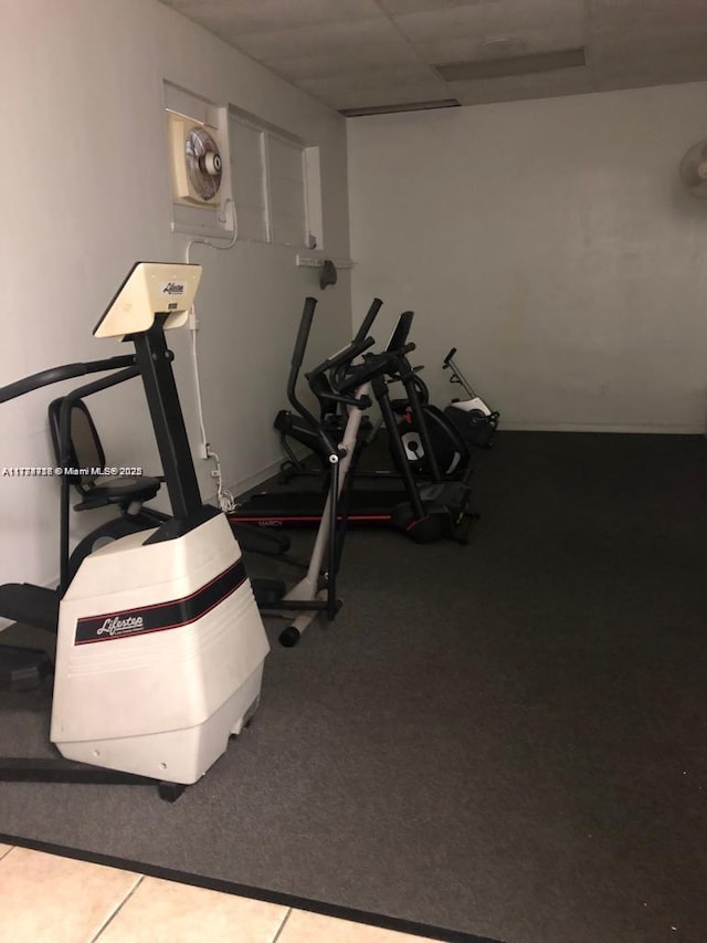 exercise room with baseboards