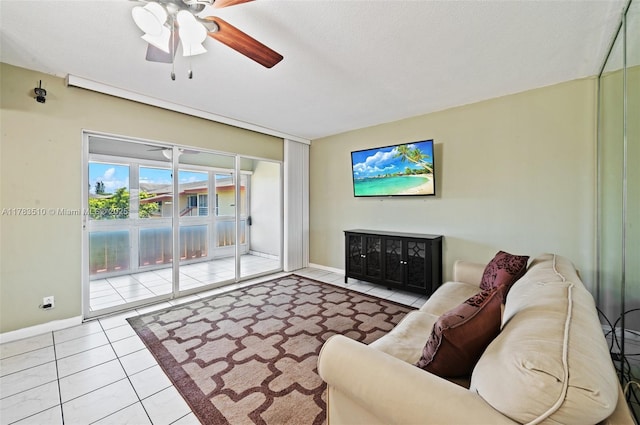 5300 Washington St Unit G323, Hollywood, FL 33021 - living room with tile patterned flooring, a ceiling fan, and baseboards