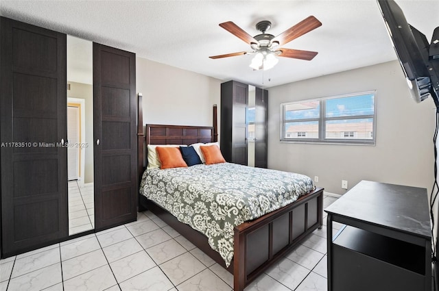 5300 Washington St Unit G323, Hollywood, FL 33021 - bedroom with light marble finish floors and a ceiling fan