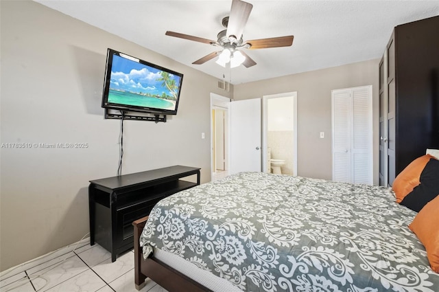 5300 Washington St Unit G323, Hollywood, FL 33021 - bedroom featuring light marble finish floors, a closet, connected bathroom, ceiling fan, and baseboards
