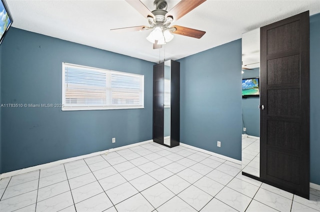 5300 Washington St Unit G323, Hollywood, FL 33021 - empty room featuring a ceiling fan and baseboards