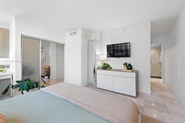 1500 Bay Rd Unit 668S, Miami Beach, FL 33139 - bedroom with baseboards, a closet, and visible vents
