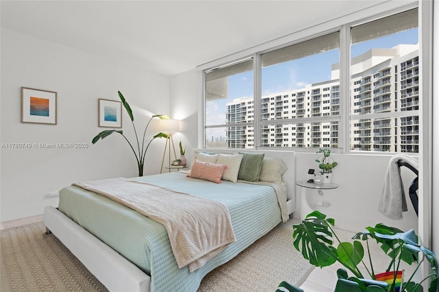 1500 Bay Rd Unit 668S, Miami Beach, FL 33139 - bedroom featuring a city view and carpet