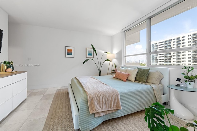 1500 Bay Rd Unit 668S, Miami Beach, FL 33139 - bedroom featuring light tile patterned floors
