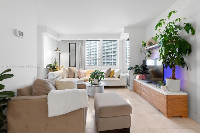 1500 Bay Rd Unit 668S, Miami Beach, FL 33139 - living area featuring light tile patterned floors
