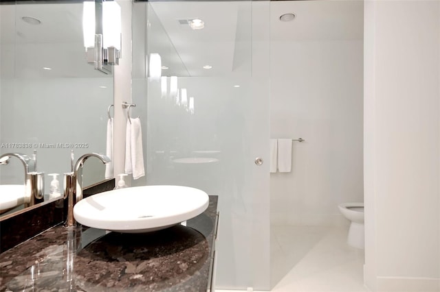 2711 S Ocean Dr Unit 2803, Hollywood, FL 33019 - bathroom with toilet, a walk in shower, a sink, and recessed lighting