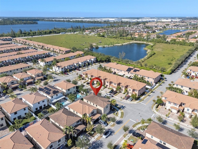 drone / aerial view featuring a water view