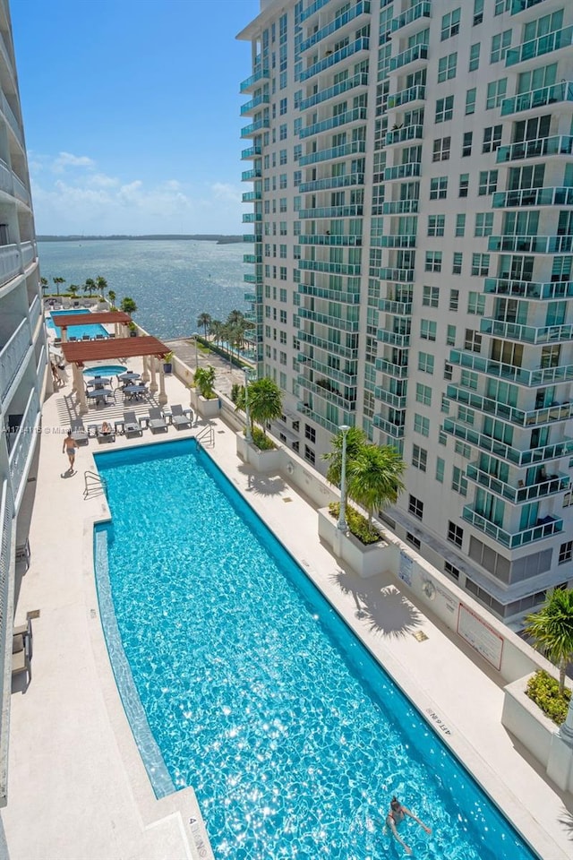 1200 Brickell Bay Dr Unit 1723, Miami, FL 33131 - community pool with a patio area and a water view