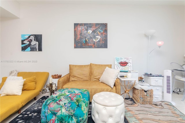 living area with tile patterned floors