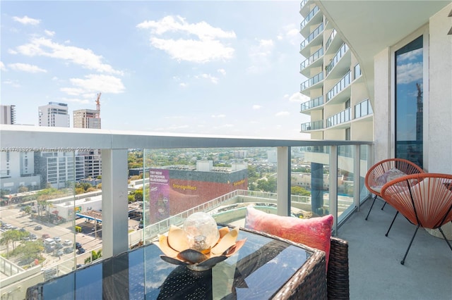 balcony featuring a view of city
