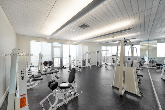 workout area featuring visible vents and plenty of natural light