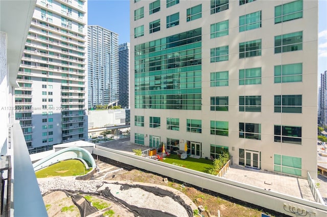 view of building exterior featuring a city view