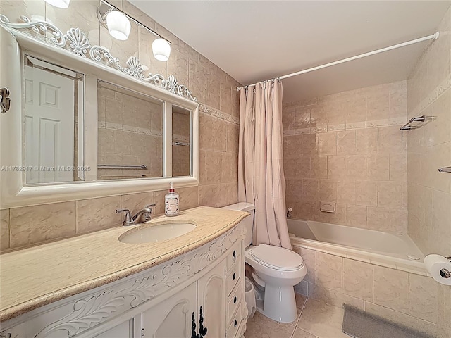 1913 S Ocean Dr Unit 110, Hallandale Beach, FL 33009 - full bath with vanity, toilet, tiled shower / bath combo, tile walls, and tile patterned floors