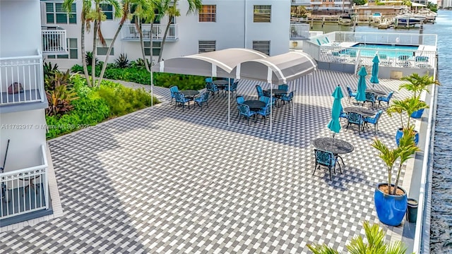 1913 S Ocean Dr Unit 110, Hallandale Beach, FL 33009 - view of patio / terrace featuring a water view