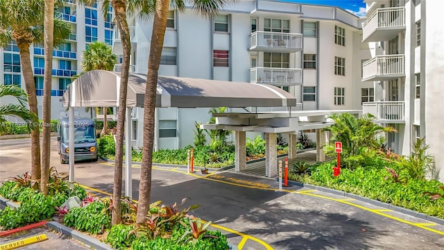 1913 S Ocean Dr Unit 110, Hallandale Beach, FL 33009 - view of property with covered and uncovered parking