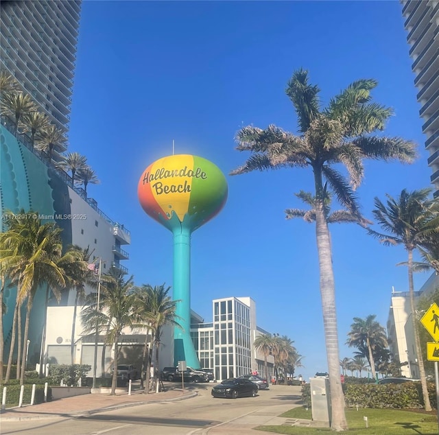 1913 S Ocean Dr Unit 110, Hallandale Beach, FL 33009 - exterior space with sidewalks, curbs, and traffic signs