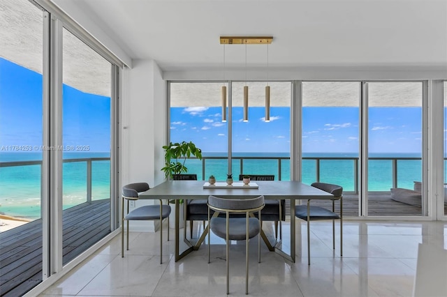 7330 Ocean Ter Unit 20-B, Miami Beach, FL 33141 - sunroom / solarium featuring a water view and a wealth of natural light