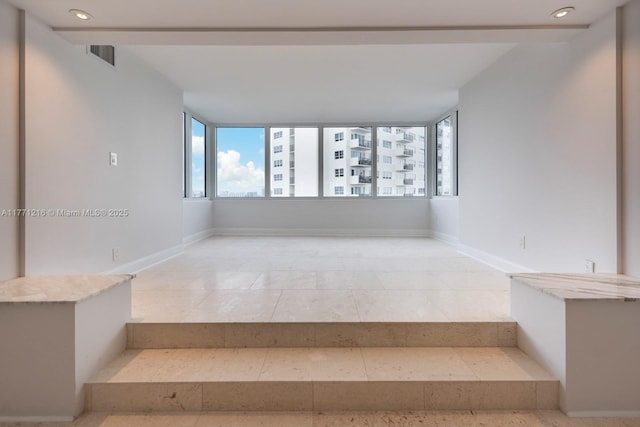 333 Sunset Dr Unit 804, Fort Lauderdale, FL 33301 - staircase featuring visible vents, baseboards, and recessed lighting