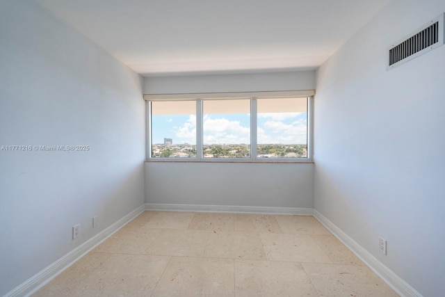 333 Sunset Dr Unit 804, Fort Lauderdale, FL 33301 - unfurnished room featuring visible vents, baseboards, and a healthy amount of sunlight