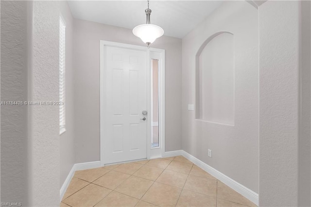 19726 Tesoro Way, Estero, FL 33967 - tiled entryway with baseboards