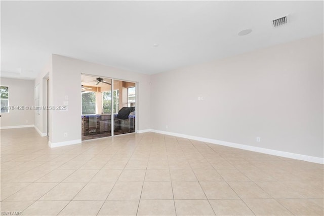 19726 Tesoro Way, Estero, FL 33967 - spare room with visible vents, baseboards, light tile patterned floors, and a wealth of natural light