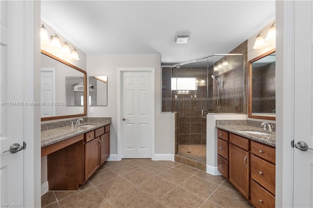 19726 Tesoro Way, Estero, FL 33967 - full bathroom featuring tile patterned flooring, a sink, two vanities, and a shower stall