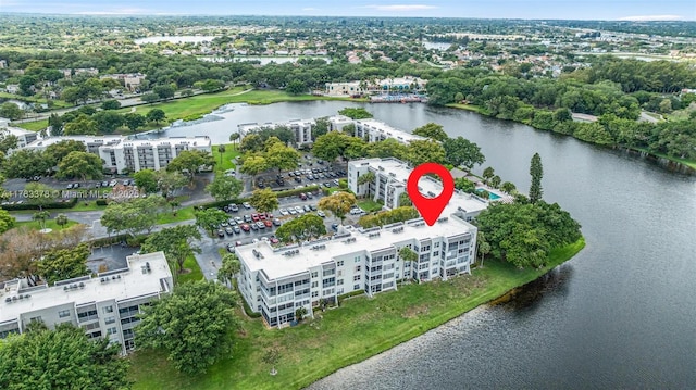 bird's eye view with a water view