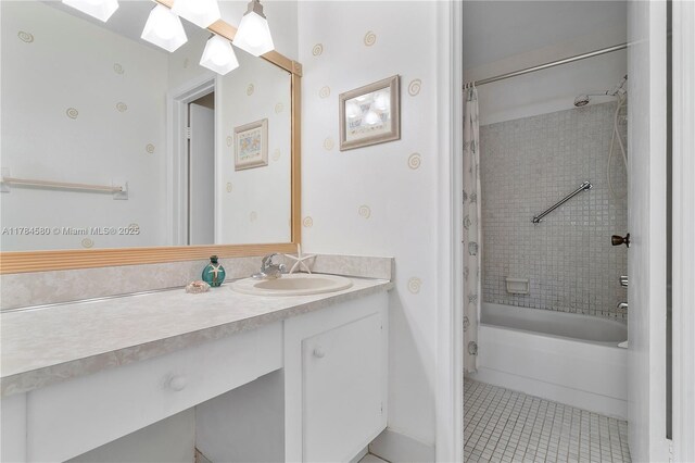 419 SW Natura Ave Unit C, Deerfield Beach, FL 33441 - full bath featuring tile patterned flooring, vanity, and shower / tub combo with curtain