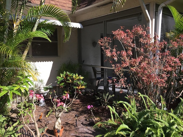 419 SW Natura Ave Unit C, Deerfield Beach, FL 33441 - view of side of property with stucco siding