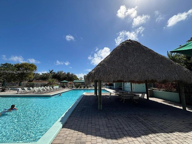 419 SW Natura Ave Unit C, Deerfield Beach, FL 33441 - community pool with a patio area