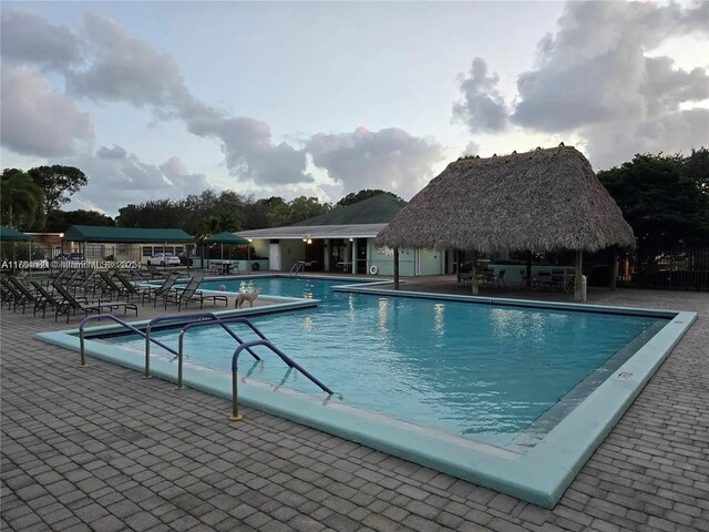 419 SW Natura Ave Unit C, Deerfield Beach, FL 33441 - community pool featuring a patio