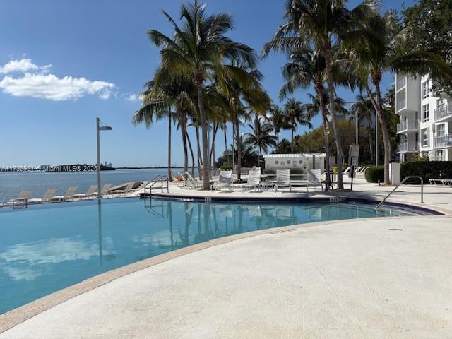 community pool with a patio