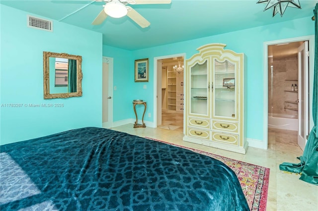 1811 Jefferson St Unit 203, Hollywood, FL 33020 - bedroom featuring ensuite bath, ceiling fan, and baseboards