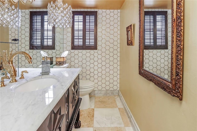 1811 Jefferson St Unit 203, Hollywood, FL 33020 - bathroom featuring toilet, tile walls, vanity, and baseboards