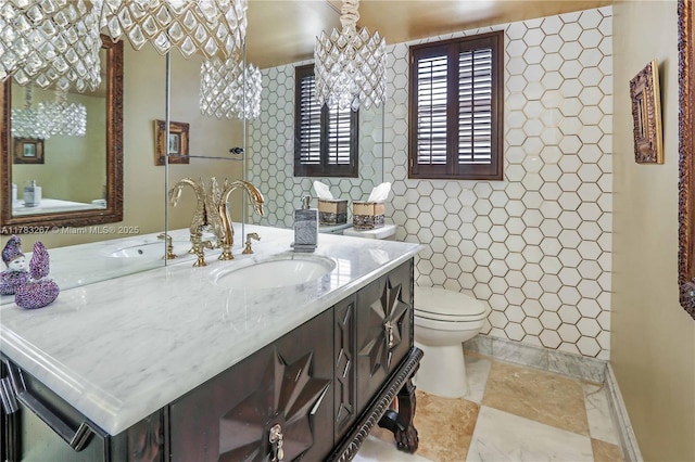 1811 Jefferson St Unit 203, Hollywood, FL 33020 - bathroom with toilet, tile walls, and vanity
