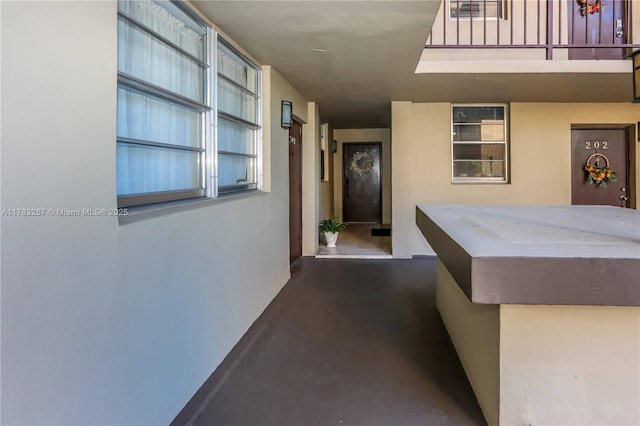 1811 Jefferson St Unit 203, Hollywood, FL 33020 - view of exterior entry featuring stucco siding