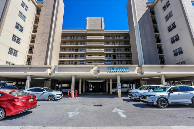 1811 Jefferson St Unit 203, Hollywood, FL 33020 - view of apartment building / complex with covered parking