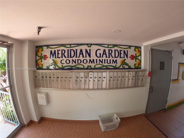 525 Meridian Ave Unit 105, Miami Beach, FL 33139 - interior details with mail area and baseboards