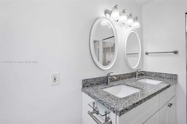 bathroom with double vanity and a sink