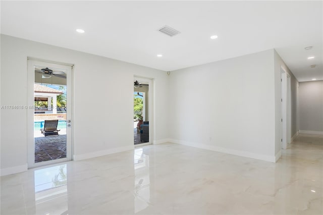 spare room with recessed lighting, visible vents, baseboards, and ceiling fan