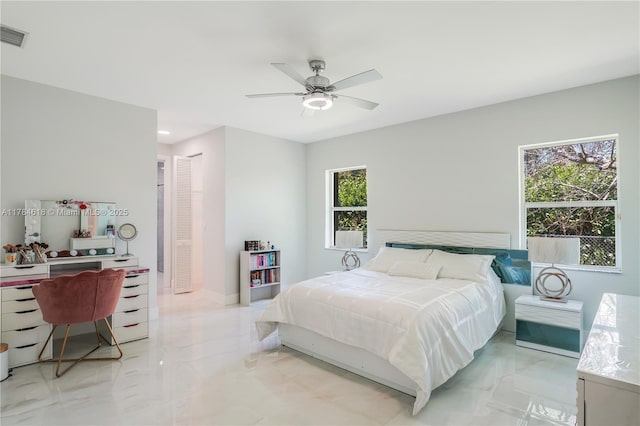 bedroom featuring visible vents, a closet, a ceiling fan, recessed lighting, and marble finish floor