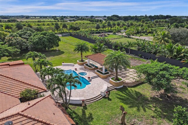 view of swimming pool featuring a patio area and a fenced in pool