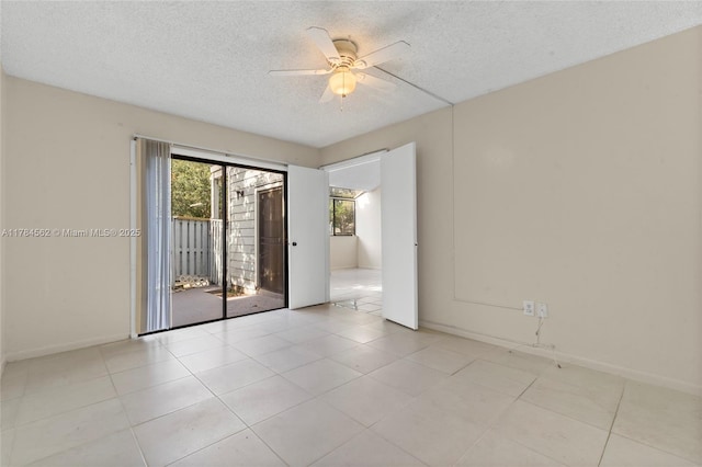 1903 Players Pl, North Lauderdale, FL 33068 - tiled empty room featuring a textured ceiling and ceiling fan