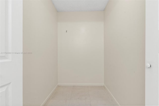 1903 Players Pl, North Lauderdale, FL 33068 - empty room with baseboards and a textured ceiling